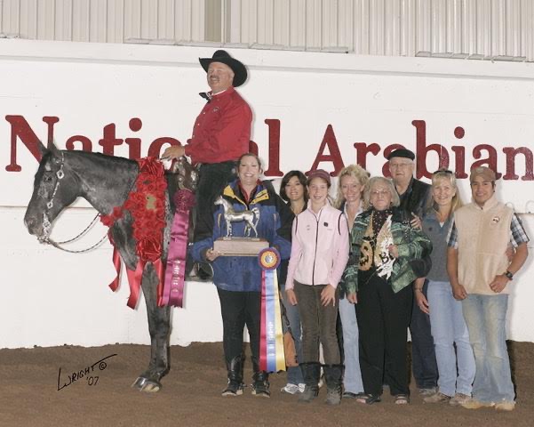 Wyatt Earp and and Mike accepting the roses for two of their three U.S. National Championships in Trail.