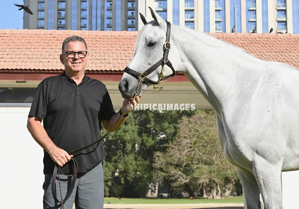Trainer Doug Watson spends some downtime with first class on the day after his gigantic win.