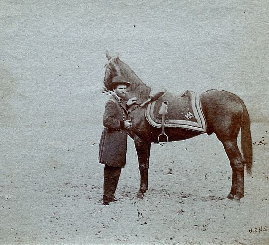 June 1864, Cold Harbor, Virginia, Confederate States of America --- Major General Ulysses Simpson Grant (1822-1885) with his horse Cincinnati at Cold Harbor, Virginia, in June 1864. --- Image by © Medford Historical Society Collection/CORBIS